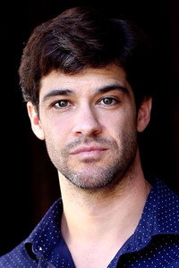 الممثل Travis Laughlin